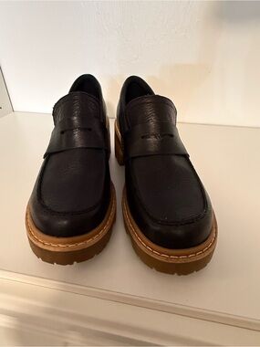 Sorel Black Penny Loafers with Brown Lug Sole